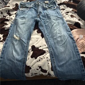 Distressed Blue Denim Jeans